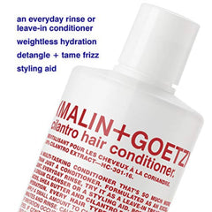 MALIN+GOETZ creamy conditioner texture close-up demonstrating smooth application