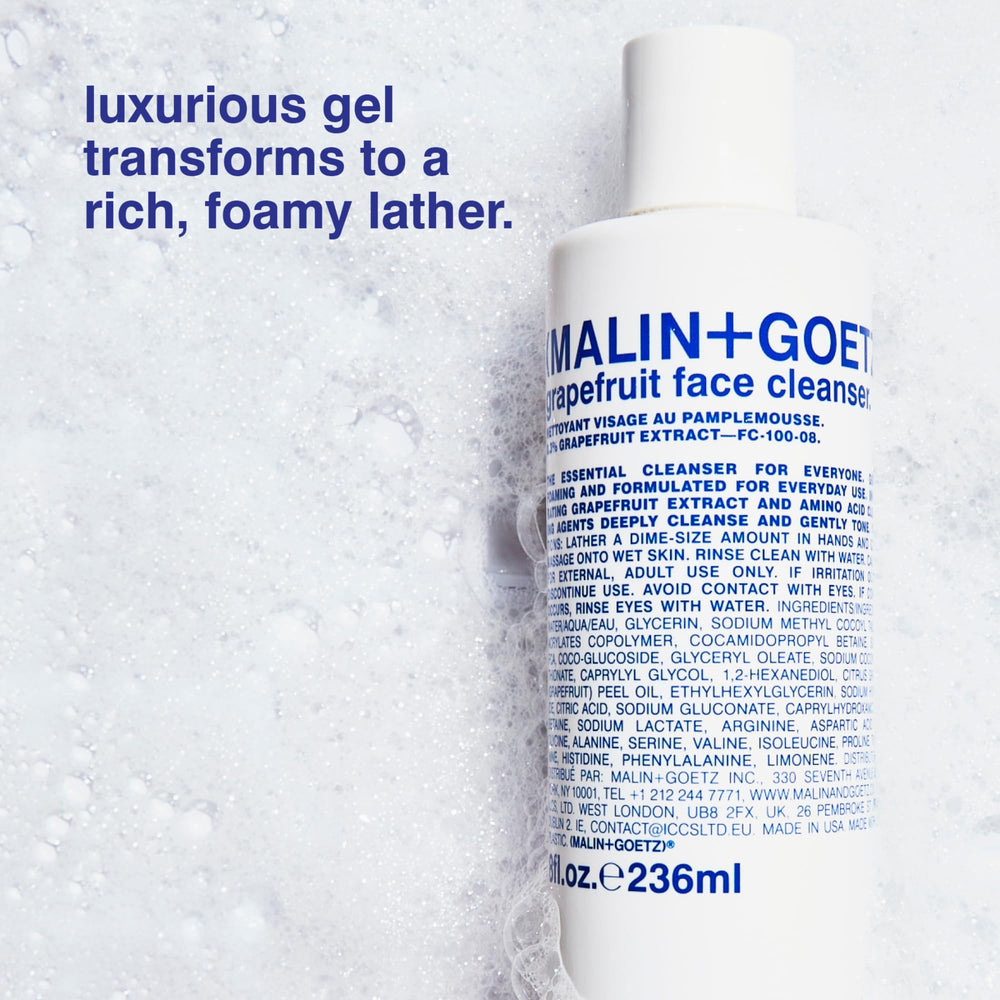 MALIN+GOETZ foamy texture on fingertip showing gentle cleansing action