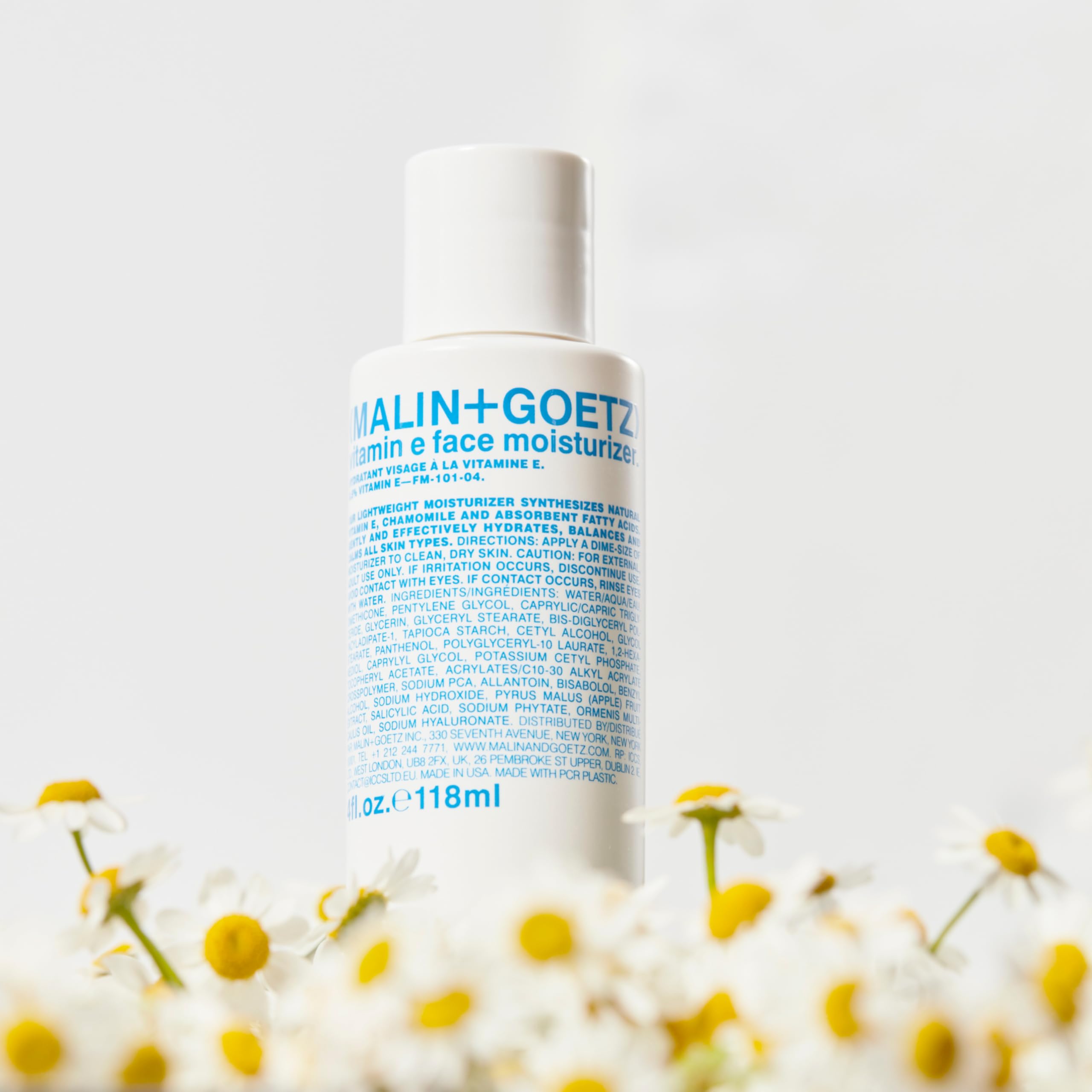 MALIN+GOETZ ingredient callout with vitamin E and hyaluronic benefit