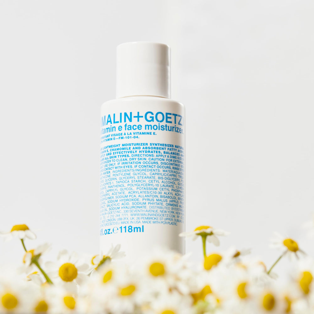 MALIN+GOETZ ingredient callout with vitamin E and hyaluronic benefit