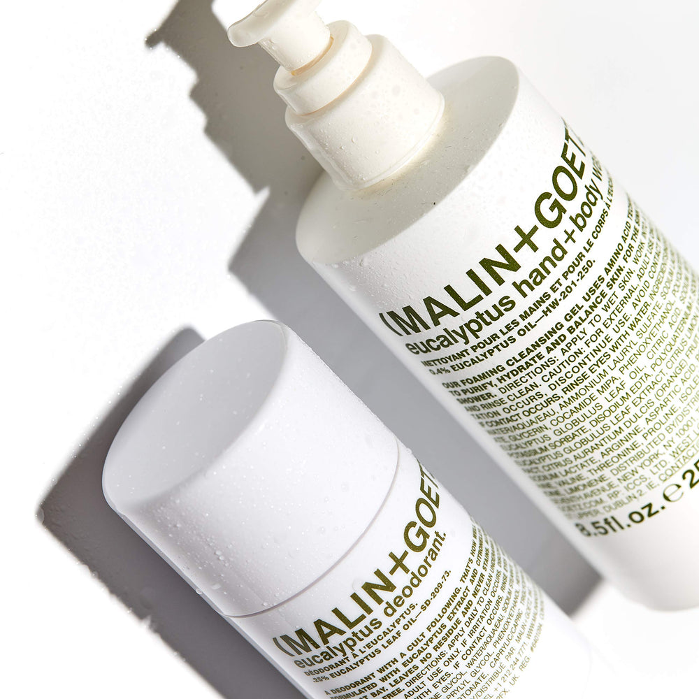 MALIN+GOETZ bottle on bathroom vanity conveying minimalist lifestyle