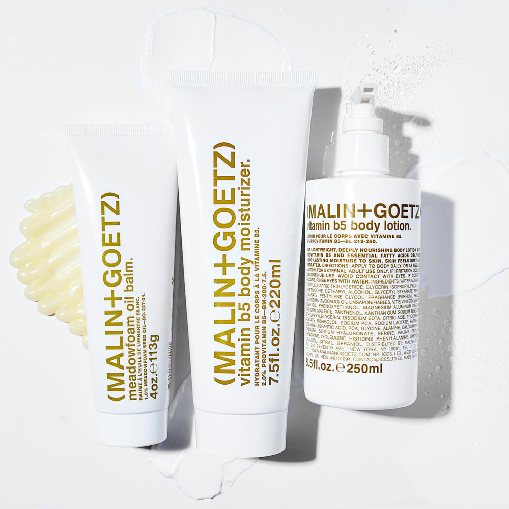 MALIN+GOETZ bottle on bathroom shelf highlighting clean packaging for daily routines