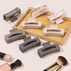 Mandydov clip tucked in a handbag, travel-ready styling solution