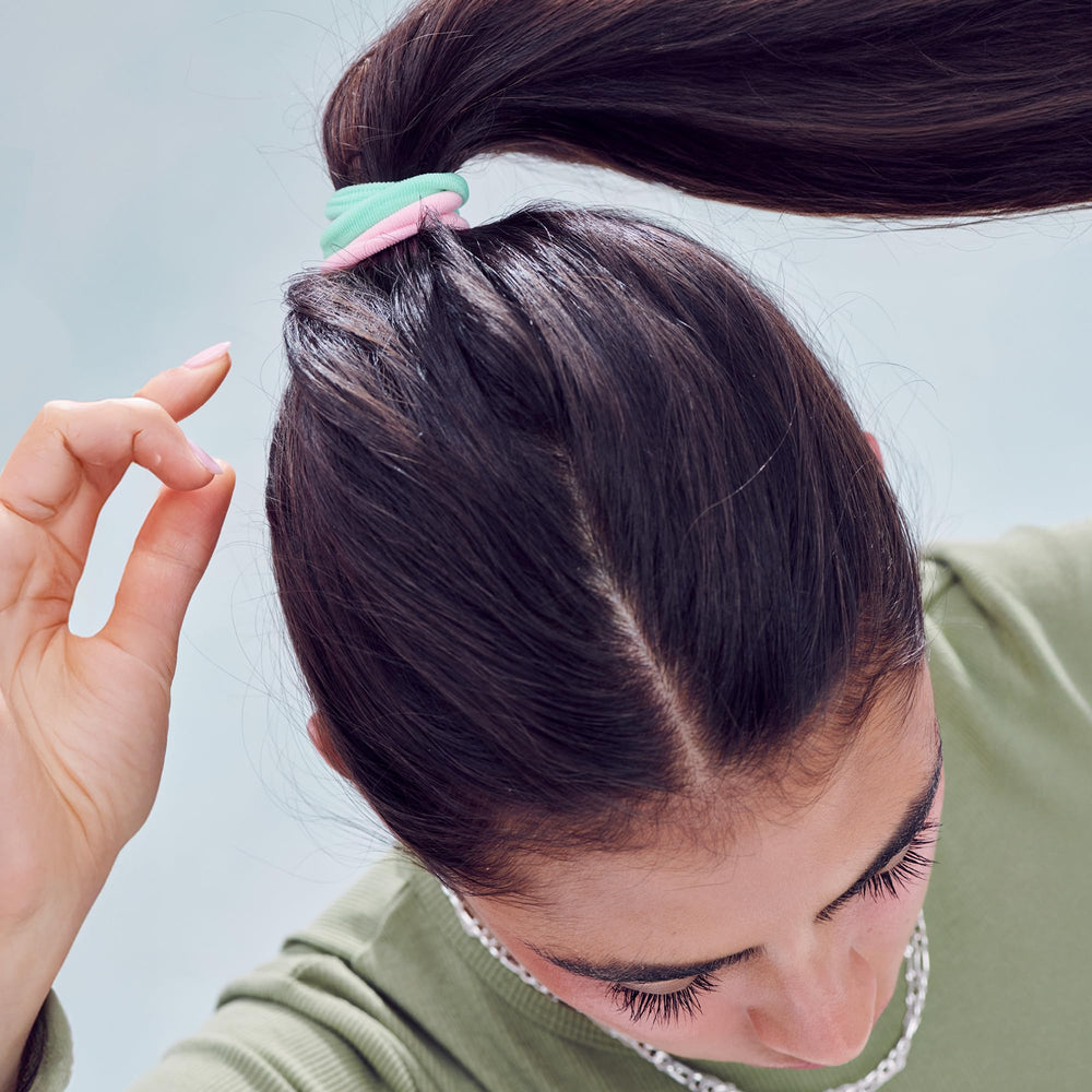 Mane hair tie securing a high ponytail, demonstrating strong hold and comfort