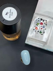 Maniology sticky base texture on nail holding chrome powder evenly for smooth finish