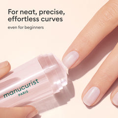 Manucurist Mani Stamper in use pressing a clean French tip quickly