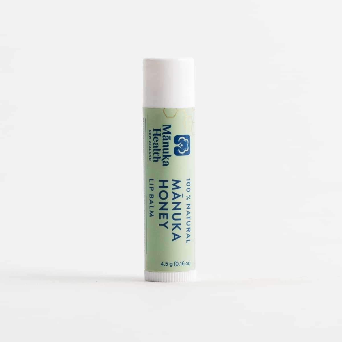 Manuka Health balm in hand illustrating pocket-sized convenience benefit