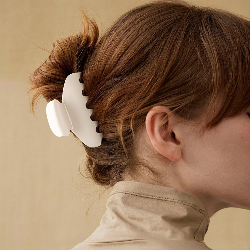 MAORULU clip holding a ponytail in use, showing firm grip and comfortable wear