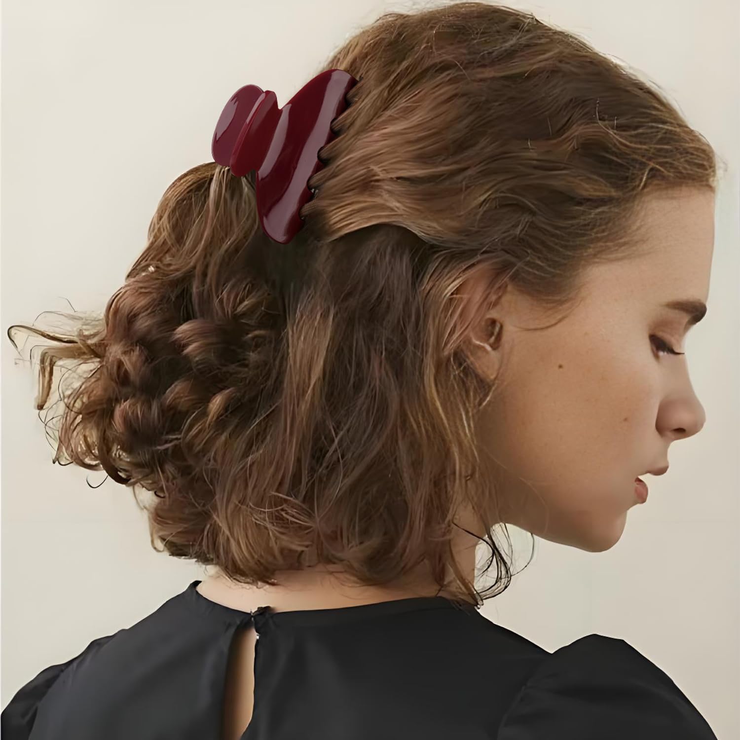 MAORULU clip securing a low bun, holding style comfortably all day