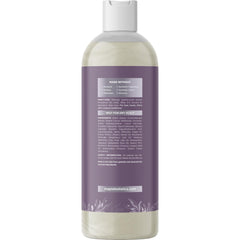 Maple Holistics bottle beside rosemary sprigs showing botanical formulation