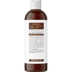 Hand holding Maple Holistics bottle to show true scale and travel-friendly size