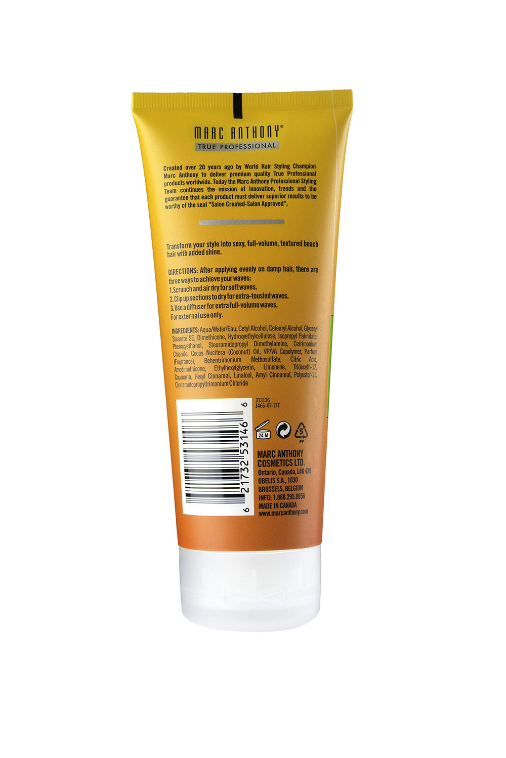 Marc Anthony cream texture closeup on fingers, shows smooth coconut-enriched formula for soft waves