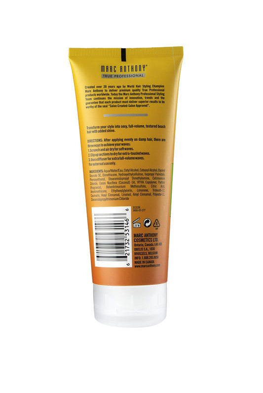 Marc Anthony cream texture closeup on fingers, shows smooth coconut-enriched formula for soft waves