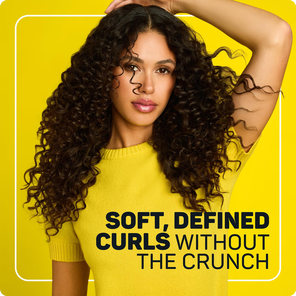 Marc Anthony defined curls after drying showing frizz control and soft shine