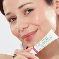 Mario Badescu acai and vanilla in hand to show size and travel-friendly convenience