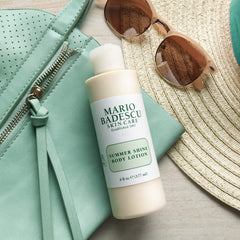 Mario Badescu bottle with natural light portraying candlelit luminous finish