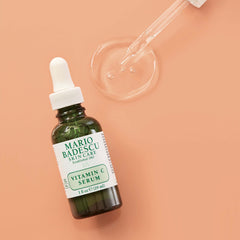 Mario Badescu hand applying serum demonstrating single-handed use and effortless absorption