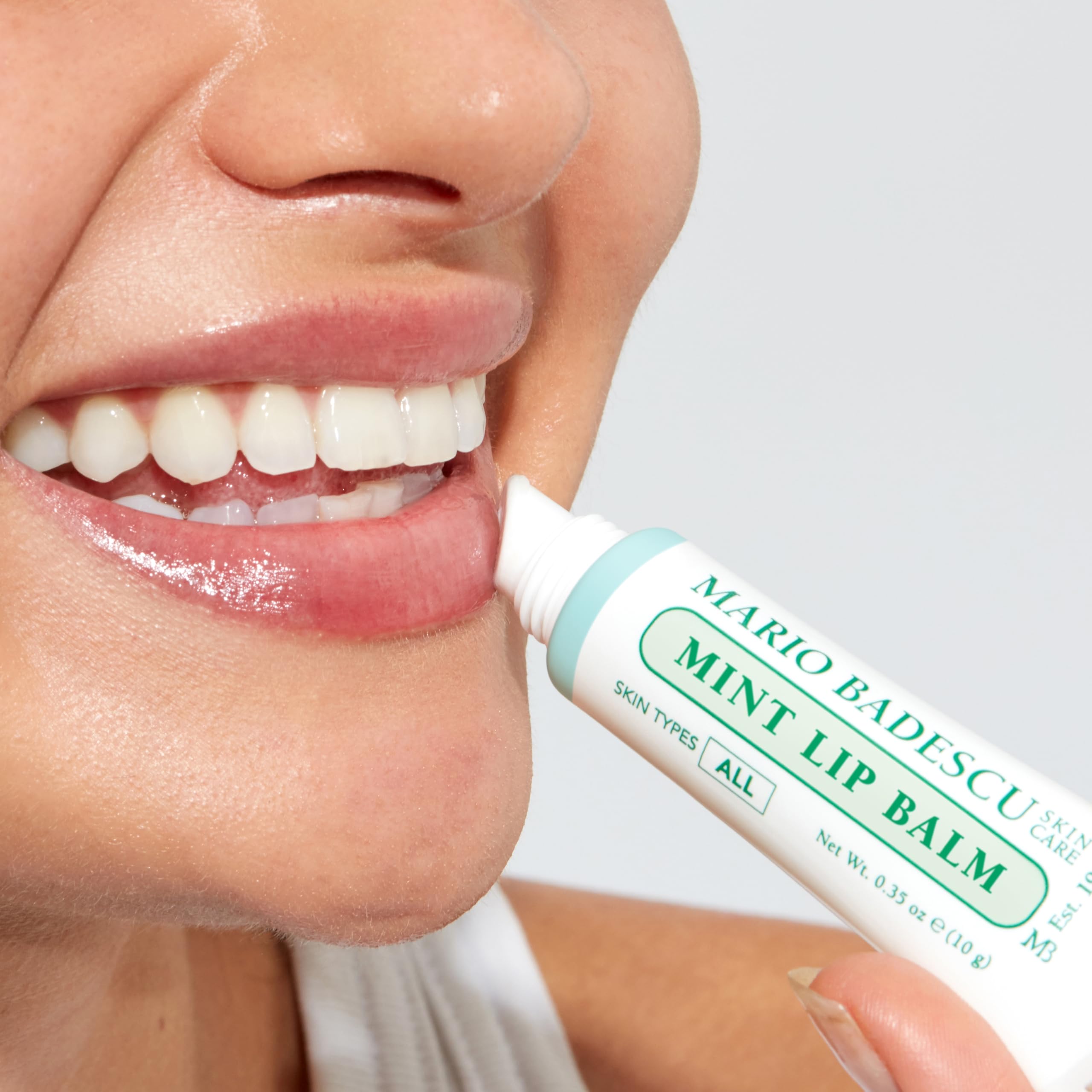 Mario Badescu mint lip balm open cap with applicator tip for controlled, mess-free use