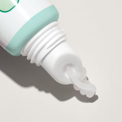 Mario Badescu mint lip balm texture close-up displaying creamy, nourishing finish