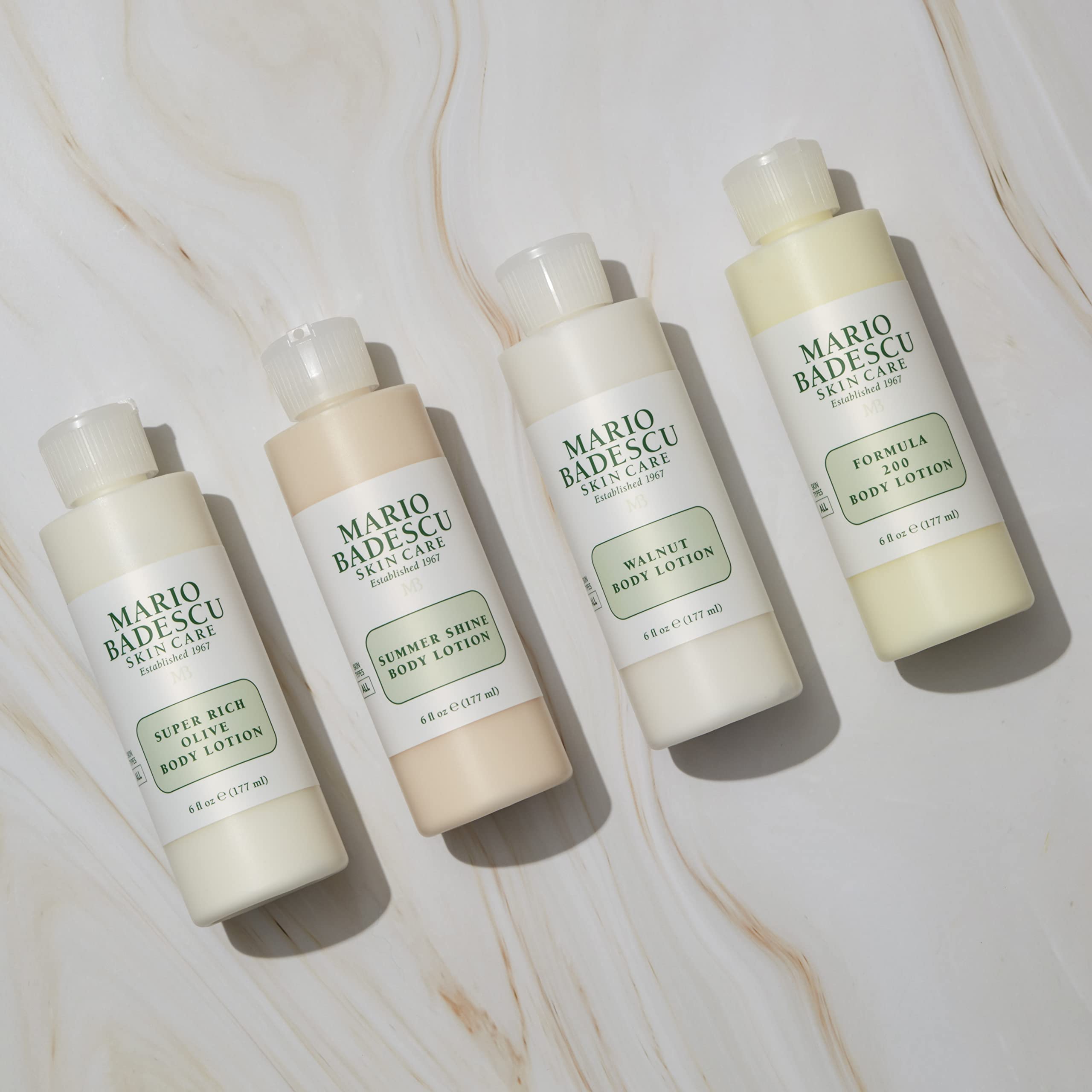 Mario Badescu creamy olive lotion texture close-up demonstrating smooth absorption