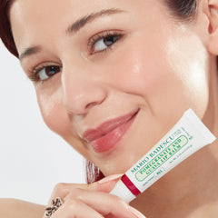 mario badescu open cap revealing smooth balm texture for quick use
