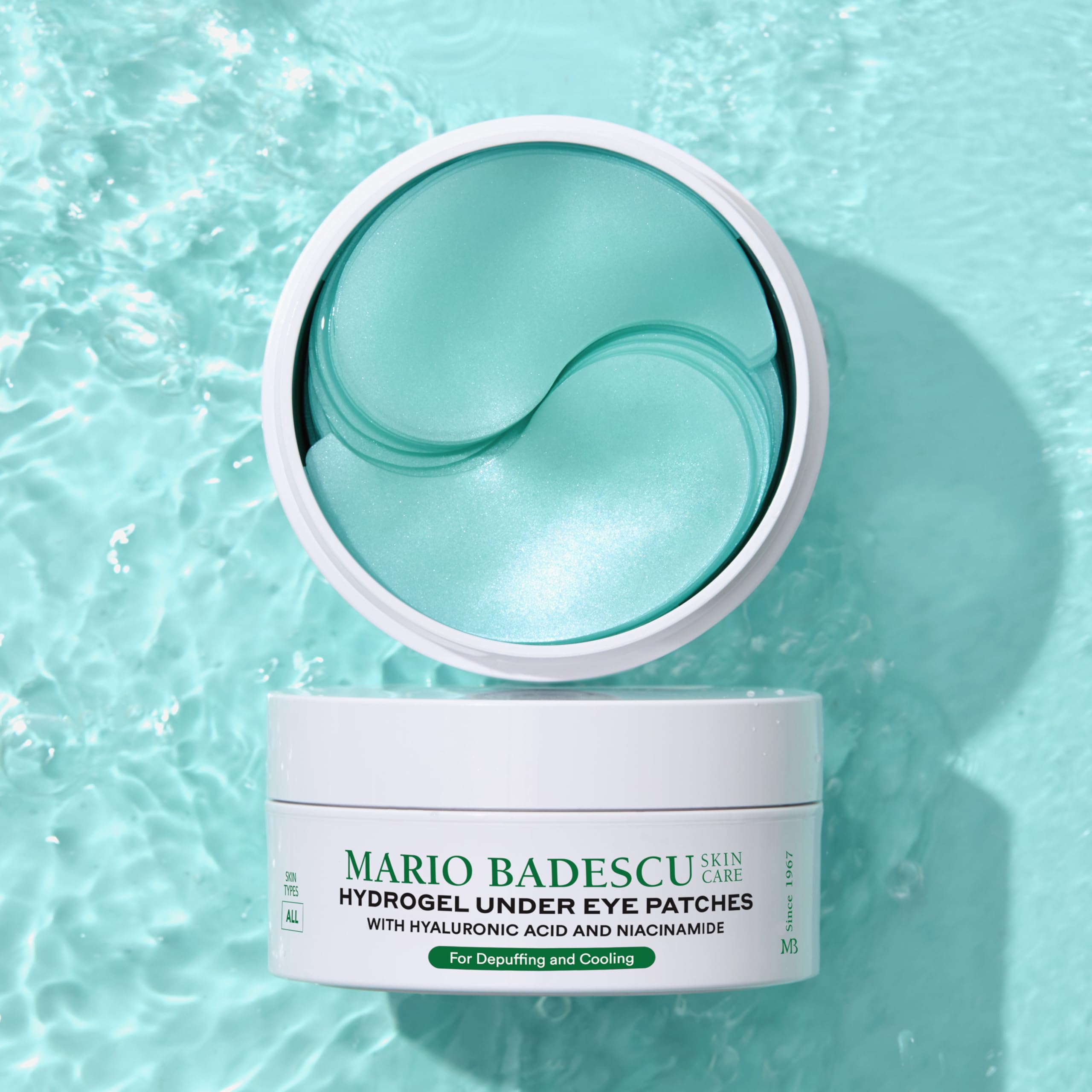 Mario Badescu patches beside a coin for size comparison and travel convenience