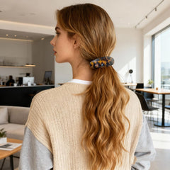 Markuii barrette worn in half-up hairstyle demonstrating comfortable all-day wear