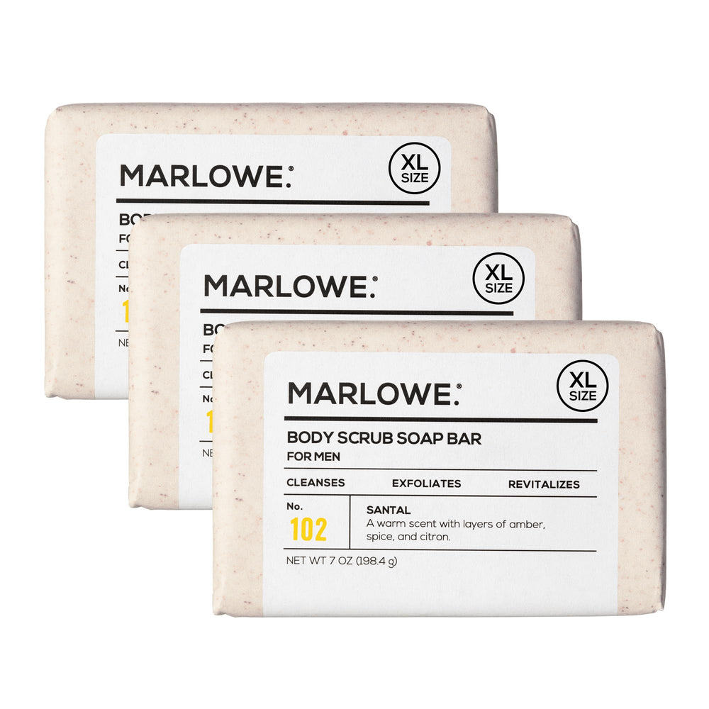 MARLOWE. front view of the santal scrub bar showing scent and size benefits