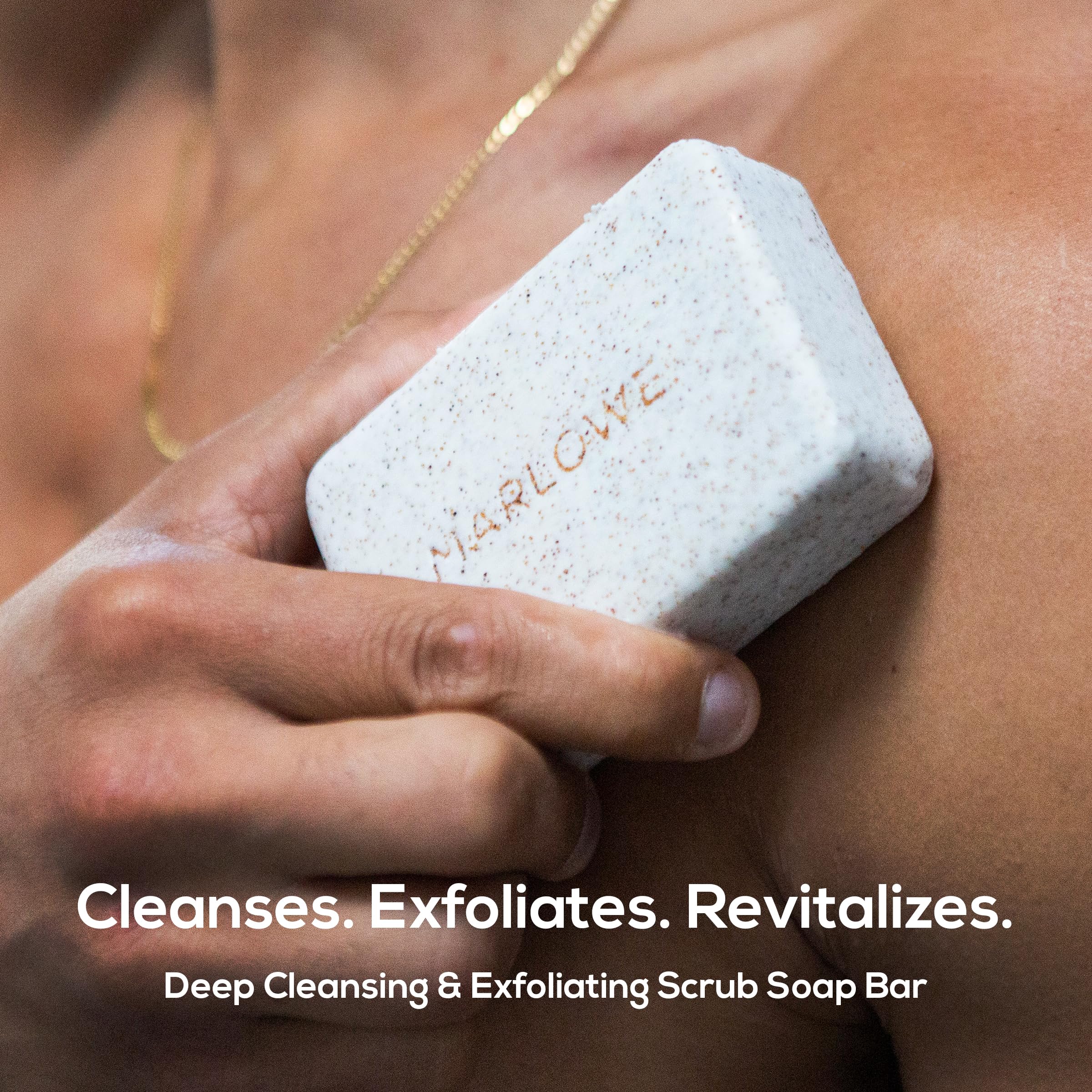 MARLOWE. close-up of bar texture revealing exfoliant grit for effective smoothing