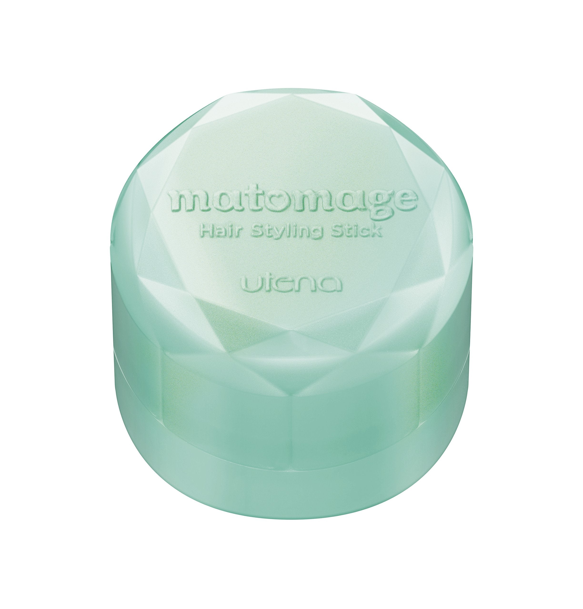 Matomege UTENA beside a hand to show 13 g size and travel-ready benefit