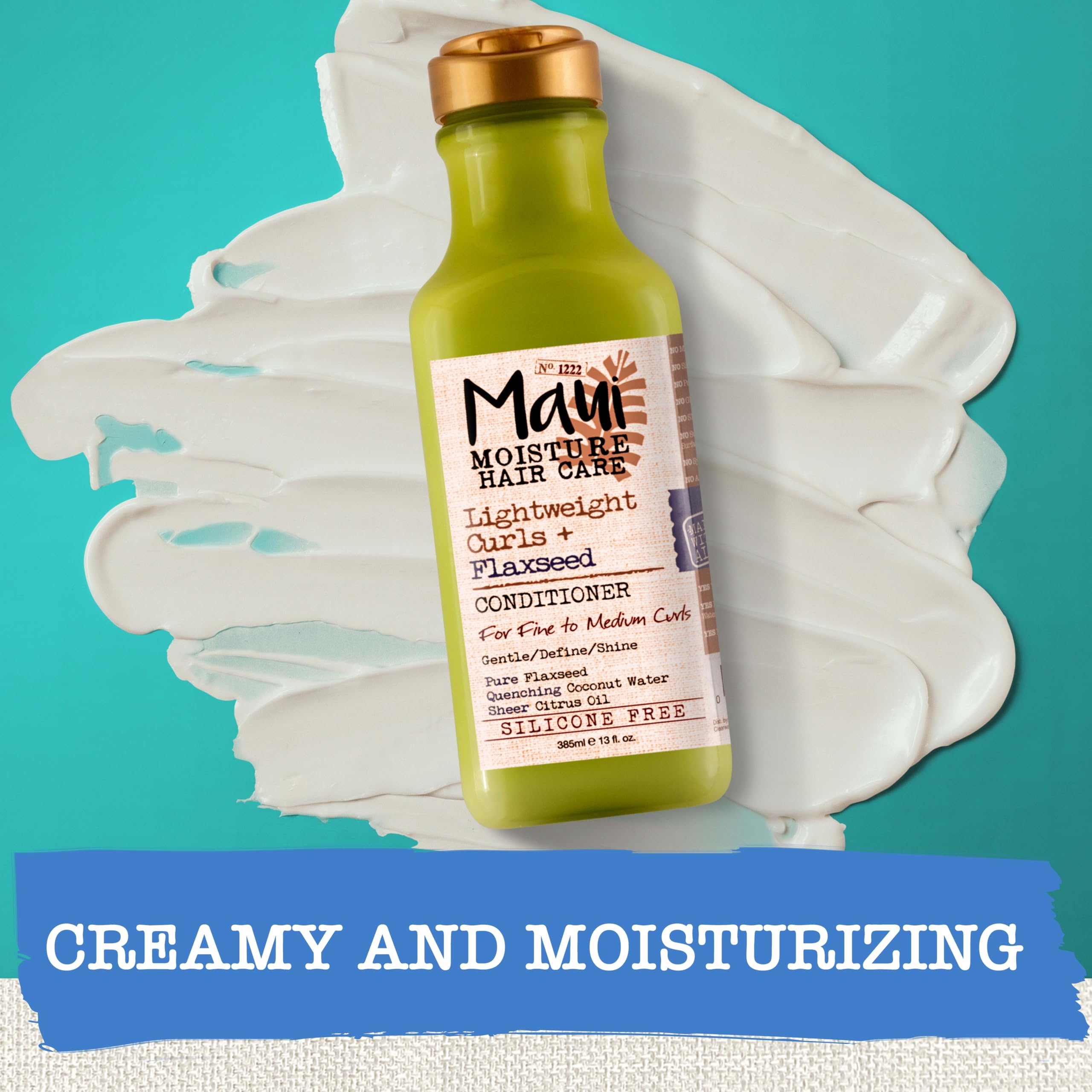 Hand holding Maui Moisture bottle for size comparison and easy use visual
