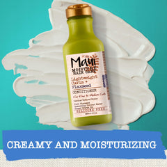 Hand holding Maui Moisture bottle for size comparison and easy use visual
