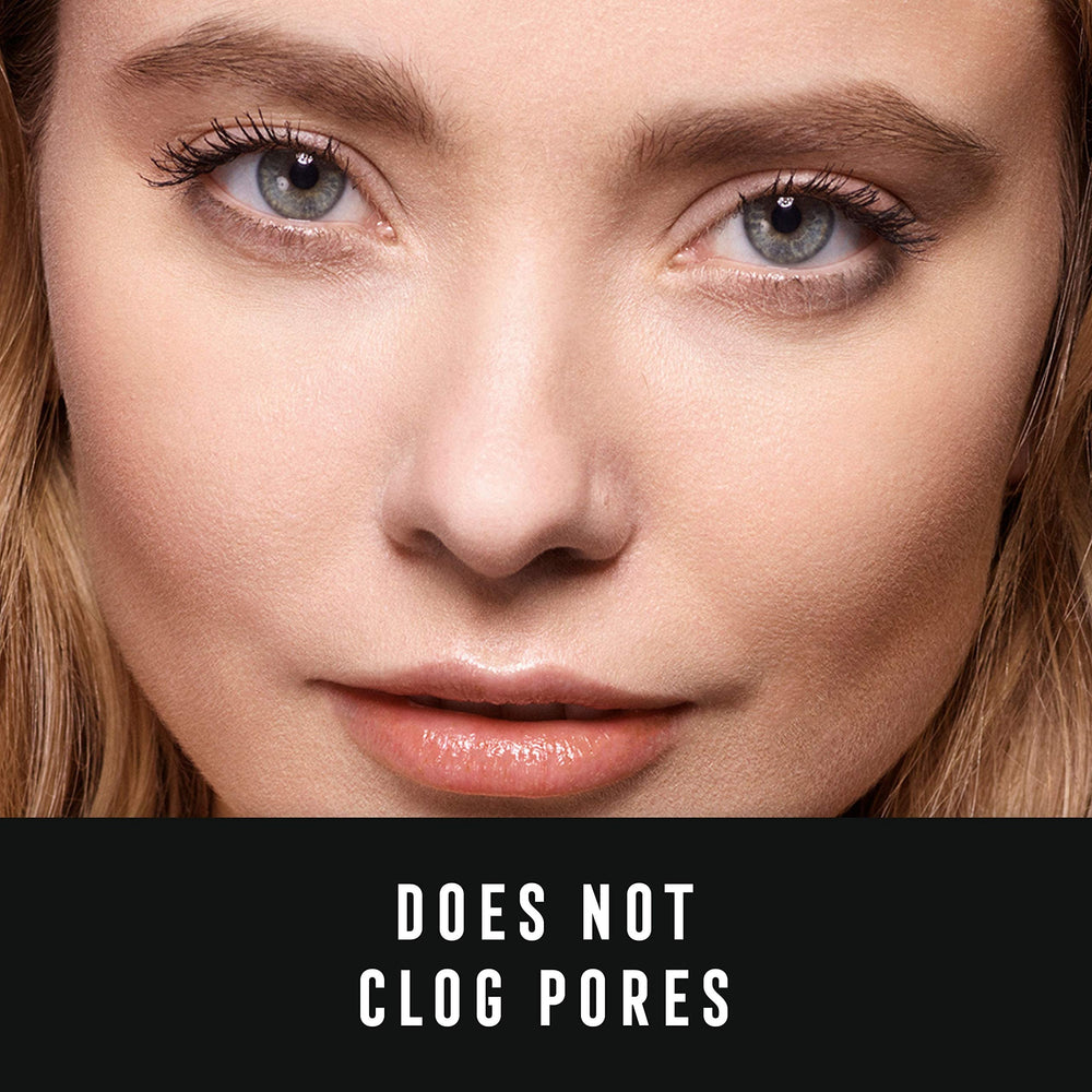 Max Factor application with compact mirror showing on-the-go touch-up practicality