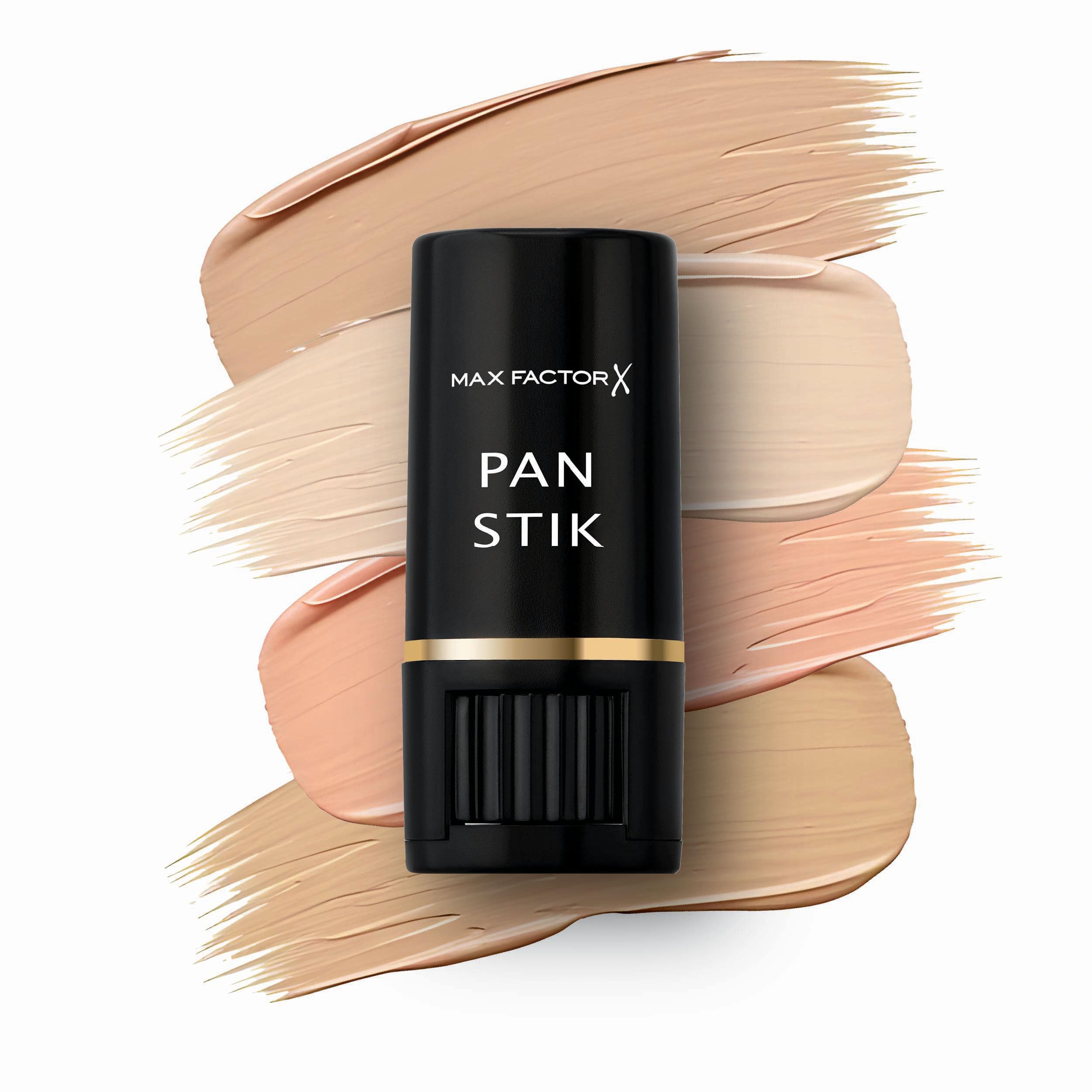 Max Factor Pan Stik being applied to face for quick touch-up and concealment