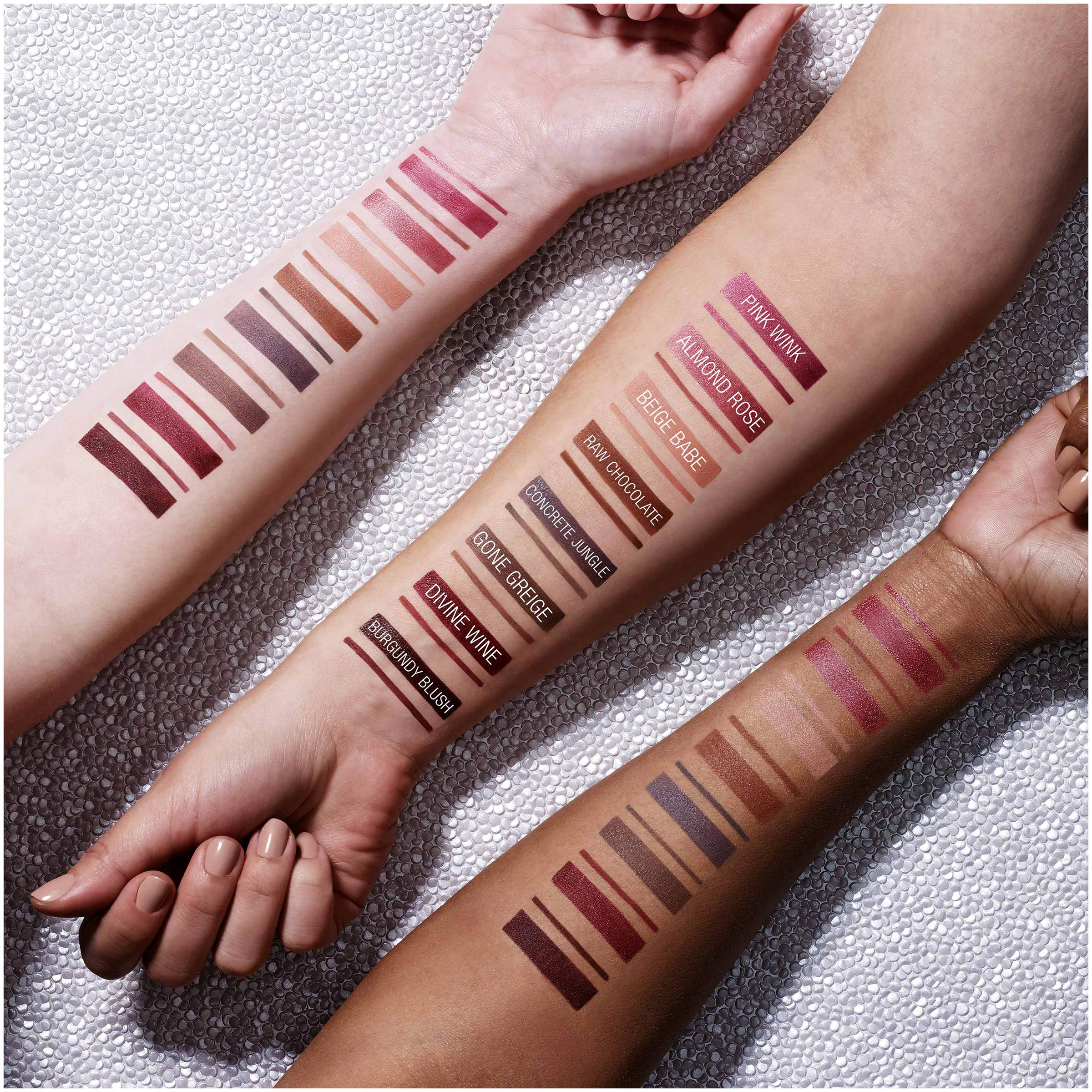 Maybelline Almond Rose application by mirror illustrating quick touch-up benefit