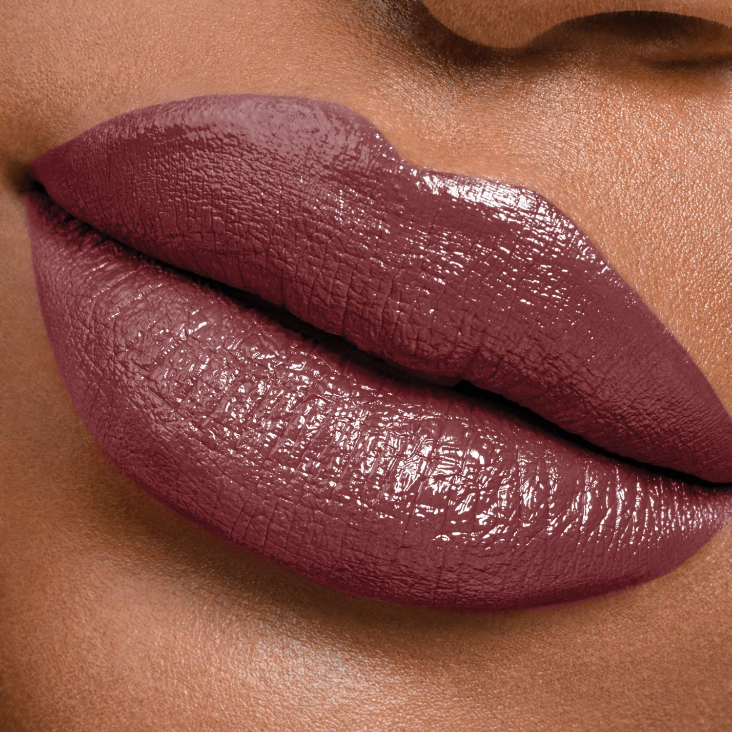 Maybelline lip worn at evening event showing long-lasting color and statement look benefit