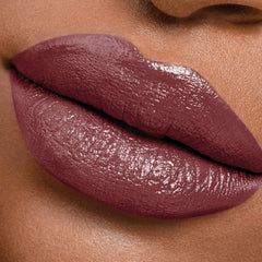 Maybelline lip worn at evening event showing long-lasting color and statement look benefit