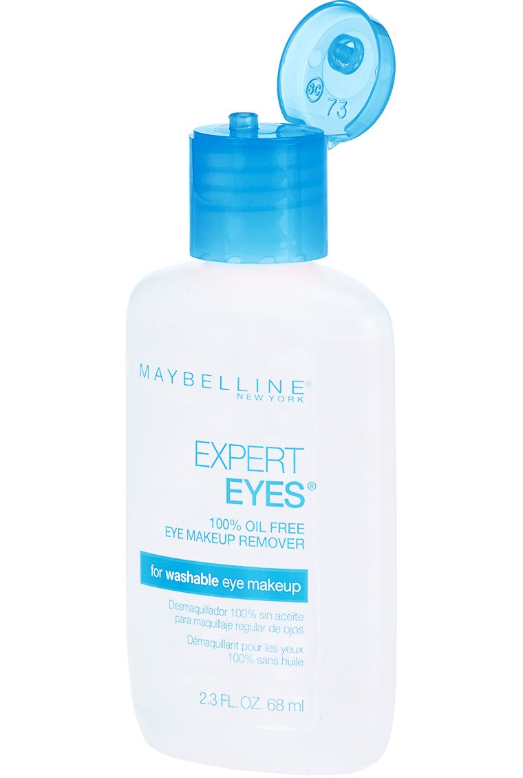 Maybelline 2.3 fl oz bottle held in hand to show scale and portable benefit