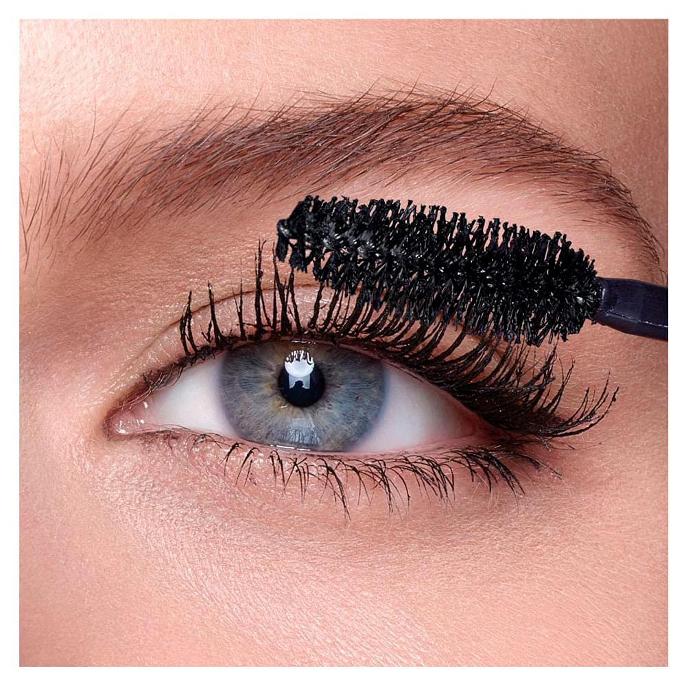 Maybelline Falsies in a makeup bag lifestyle scene showing ready-to-wear glam