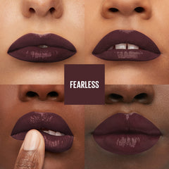 Maybelline Fearless swatch on arm displays rich brown pigment and glossy finish