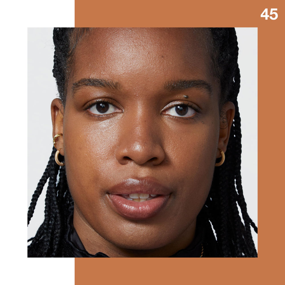 Maybelline Fit Me concealer applied under eye demonstrating brightening benefit