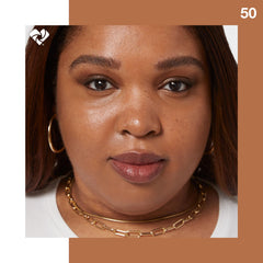 MAYBELLINE swatches on arm showing Café shade match and buildable coverage