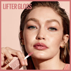 Maybelline lifter gloss lifestyle hands applying gloss showing easy one-swipe use