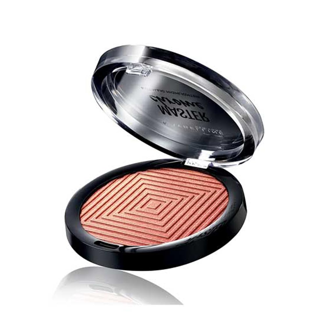 Maybelline brush pickup showing product transfer for high-impact metallic application
