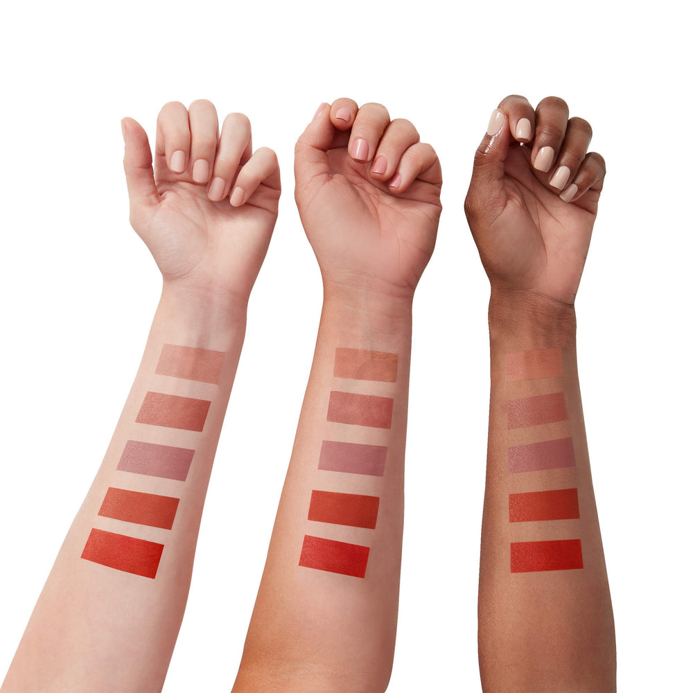 Maybelline crayon next to coin to show compact size and travel-friendly benefit