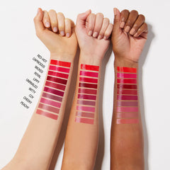 MAYBELLINE tube beside coin for size comparison, travel-friendly