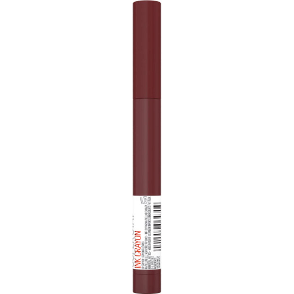 Maybelline crayon next to a coin showing portable 0.04 oz scale