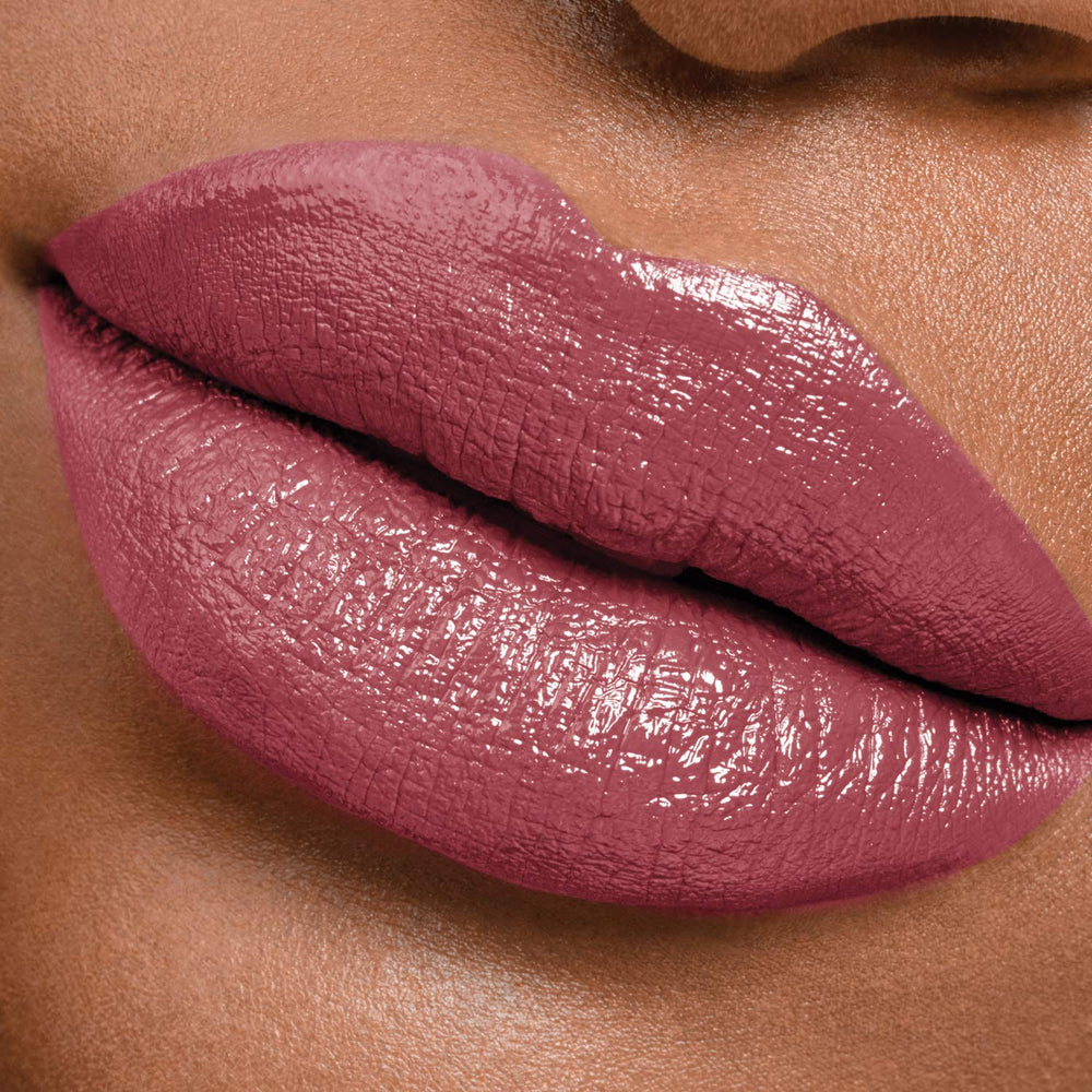 MAYBELLINE open tube showing two-step design for color and moisturizing balm