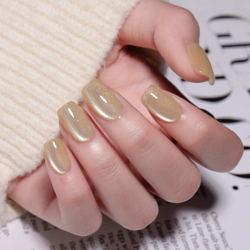 MAYCHAO finished manicure on hands showcasing salon-quality sparkle benefit