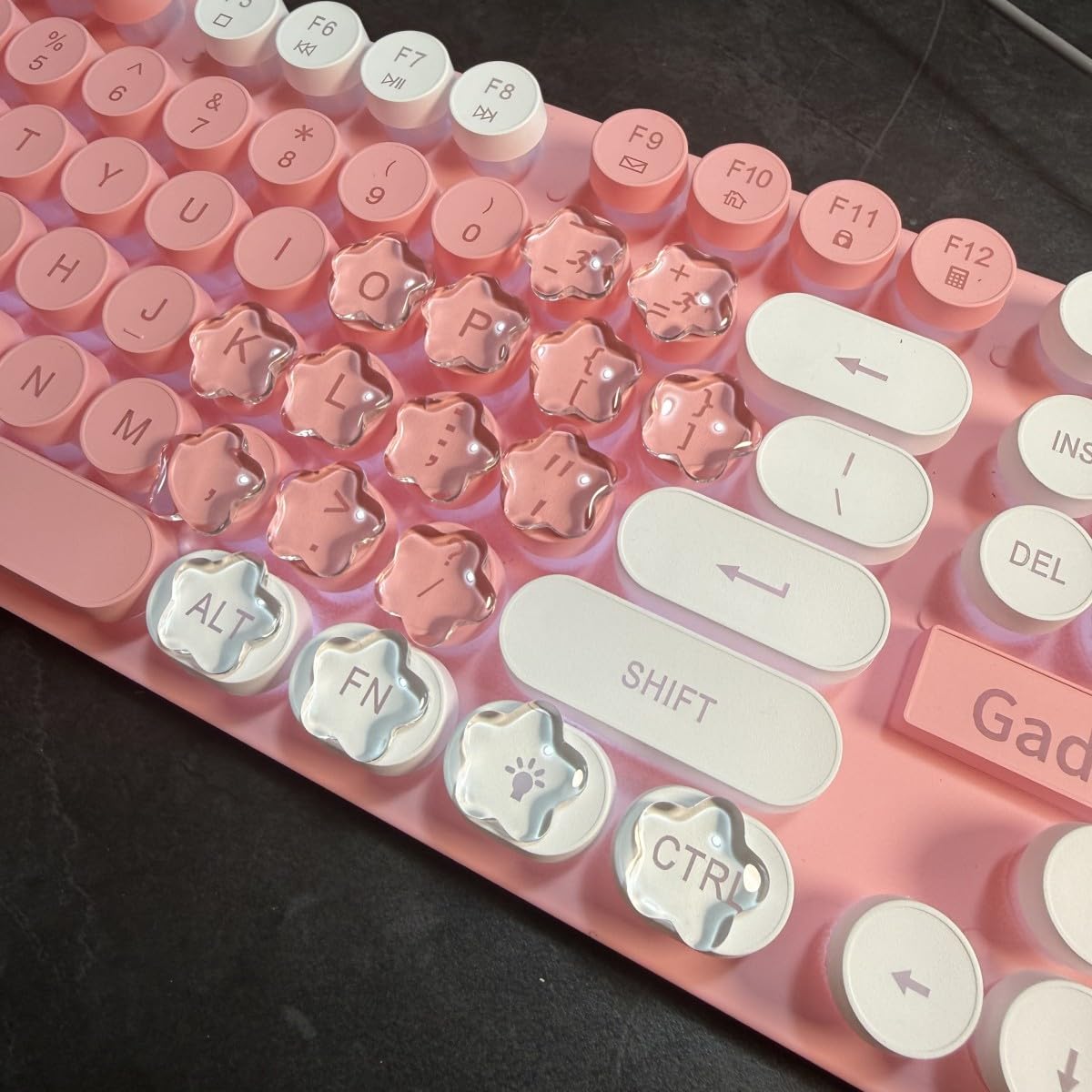 MayeBridge label and included keycaps arranged to show contents